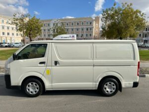 Refrigerated chiller vans delivering perishable food items across Dubai’s food supply chain