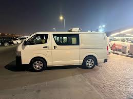 Chiller van parked on a Dubai street ready for refrigerated food delivery